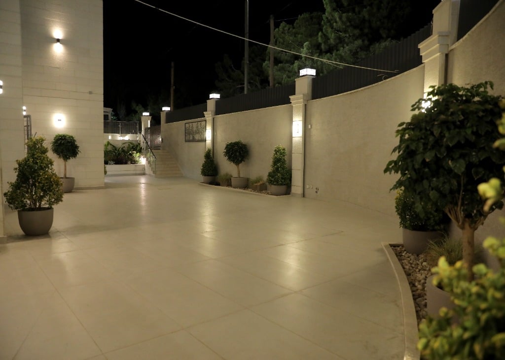 Luxury villa courtyard in West Amman at night